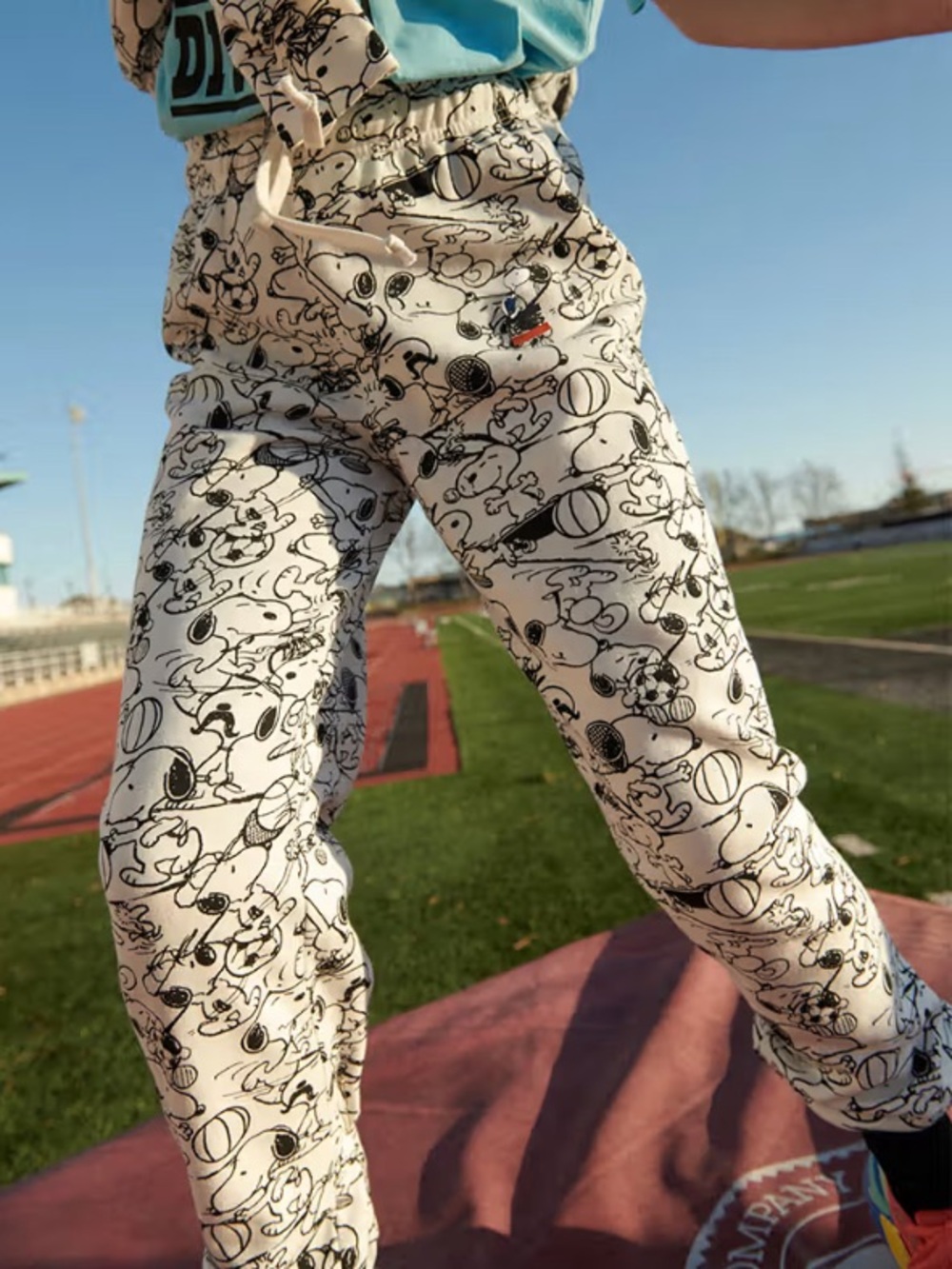 Levi's x Peanuts graphic print sweatpants an all-over Snoopy doodle design | XS
